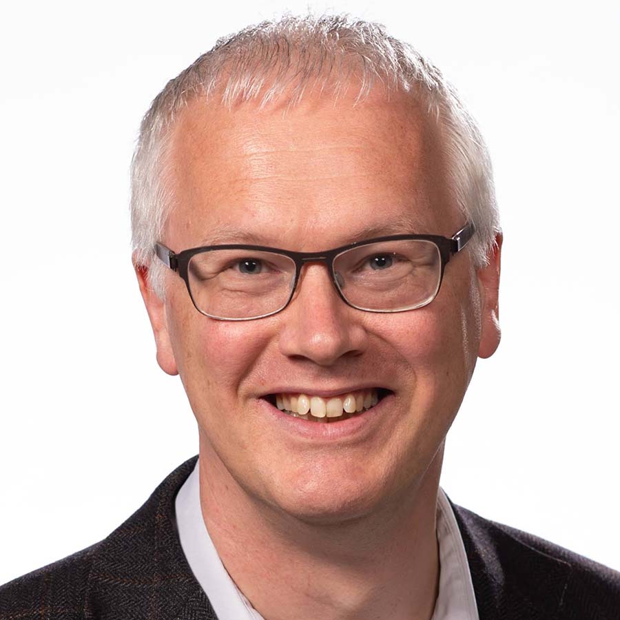 Headshot of Professor Frank den Hartog